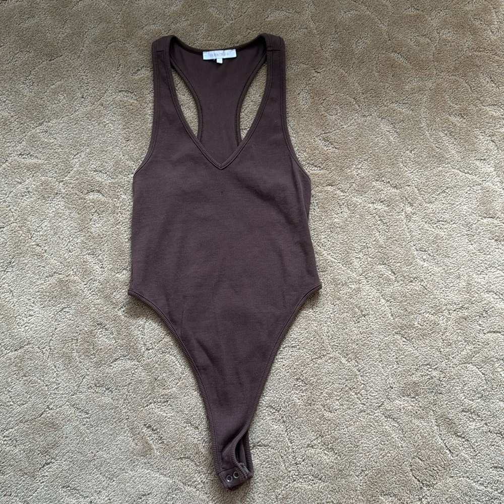 Brown body suit